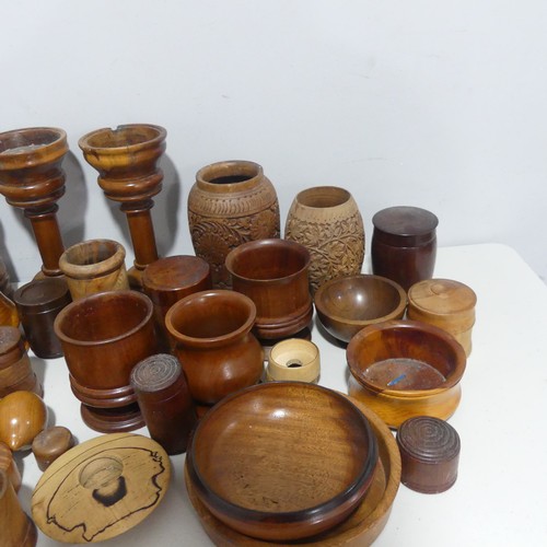 650 - A quantity of 20th century turned Treen, including, a pair of Goblets, string Boxes, Vessels, Vases,... 