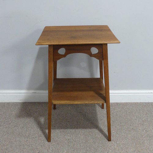 542 - An Arts and Crafts oak occasional Table, a designed retailed by Liberty & co, with pierced teard... 