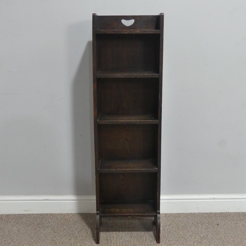 566 - A Liberty & co Arts and Crafts oak open Bookcase, of narrow proportions, bearing ivorine plaque ... 