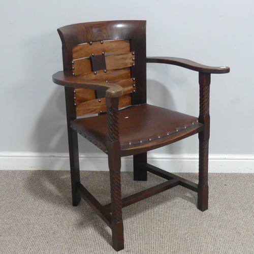 588 - A Glasgow School of Arts and Crafts oak and leather Armchair, the design in the style of George Walt... 