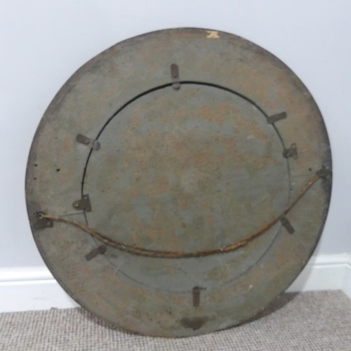 564 - An Arts and Crafts circular oak and copper Mirror, in the manner of Keswick School of Industrial Art... 