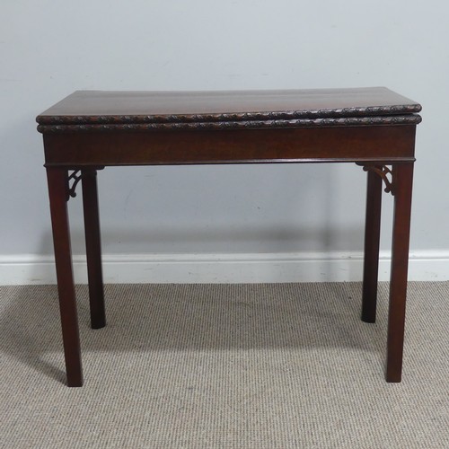 508 - A George III Chippendale mahogany carved Card Table, raised on four chamfered supports, W 91.5 cm x ... 