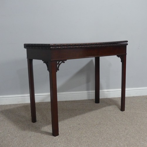 508 - A George III Chippendale mahogany carved Card Table, raised on four chamfered supports, W 91.5 cm x ... 