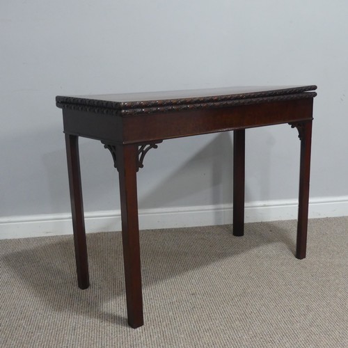 508 - A George III Chippendale mahogany carved Card Table, raised on four chamfered supports, W 91.5 cm x ... 