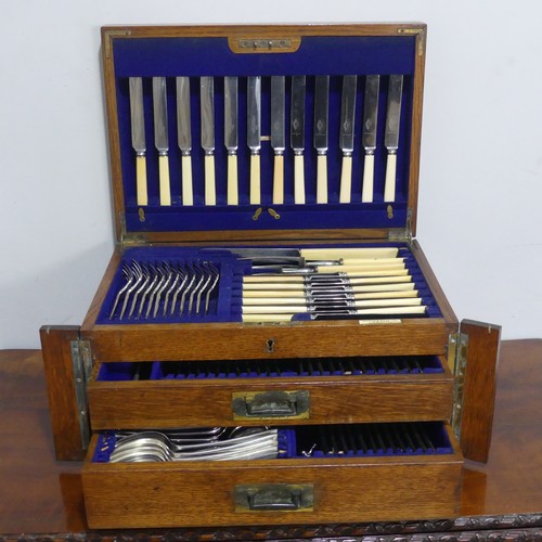 658 - A canteen of Mappin & Webb silver plated Cutlery, with brass campaign inset handles, twelve plac... 