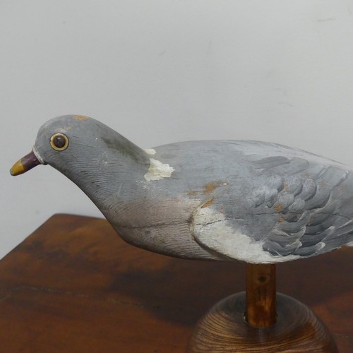 661 - A carved and polychrome painted wooden pigeon Decoy, probably by Harry Boddy, circa 1935, hollow bod... 