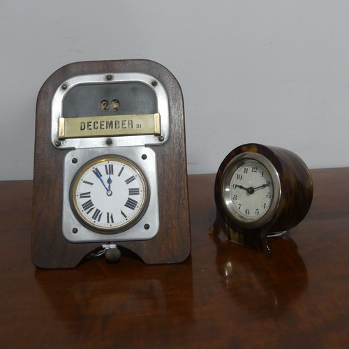 666 - A faux tortoise shell cased miniature desk Clock, the white circular dial with Arabic numerals, H 8 ... 