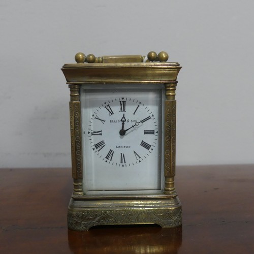 664 - A miniature Elliot & son brass cased carriage Clock, with a single train 8-day movement with whi... 