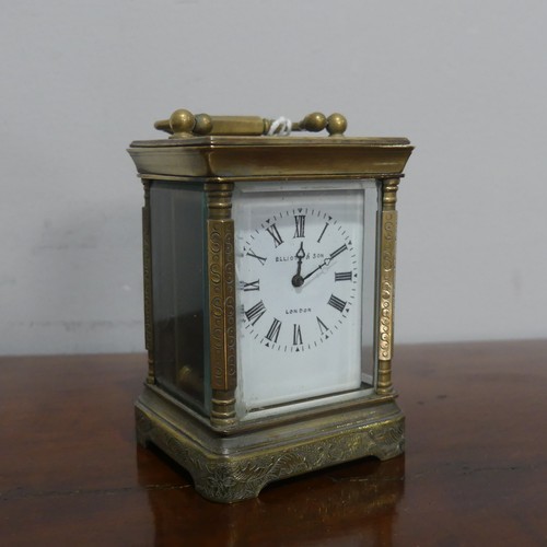 664 - A miniature Elliot & son brass cased carriage Clock, with a single train 8-day movement with whi... 