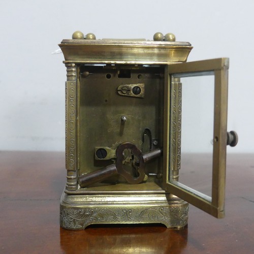 664 - A miniature Elliot & son brass cased carriage Clock, with a single train 8-day movement with whi... 