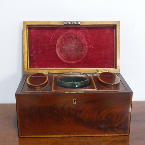 675 - A 19th century mahogany Tea Caddy, with walnut stringing, the interior complete with separate lidded... 