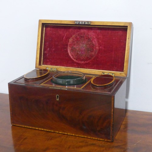 675 - A 19th century mahogany Tea Caddy, with walnut stringing, the interior complete with separate lidded... 