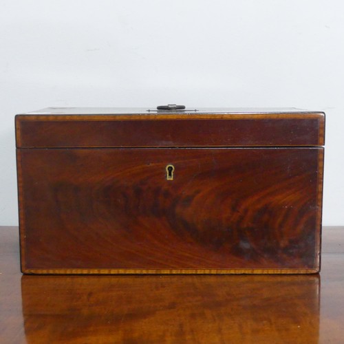 675 - A 19th century mahogany Tea Caddy, with walnut stringing, the interior complete with separate lidded... 