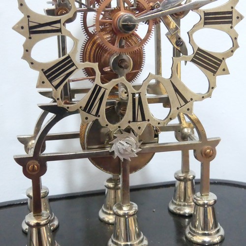 510 - A 20th century white metal and copper skeleton Clock, silvered Gothic inspired chapter ring with Rom... 