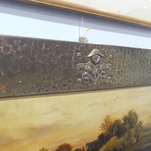 541 - An Arts and Crafts hammered copper Frame, with studwork and embossed floral motif, encasing an early... 