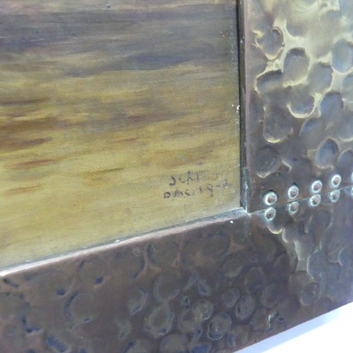 541 - An Arts and Crafts hammered copper Frame, with studwork and embossed floral motif, encasing an early... 