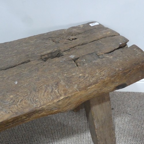 656 - An antique rustic oak Bench, of joint construction, W 115 cm x H 48 cm x D 39 cm.