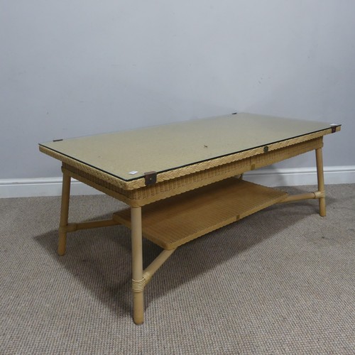 660 - A Lloyd Loom Coffee Table, with glass top and under tier, W 120 cm x H 47.5 cm x D 59 cm.... 