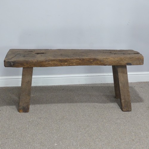 656 - An antique rustic oak Bench, of joint construction, W 115 cm x H 48 cm x D 39 cm.