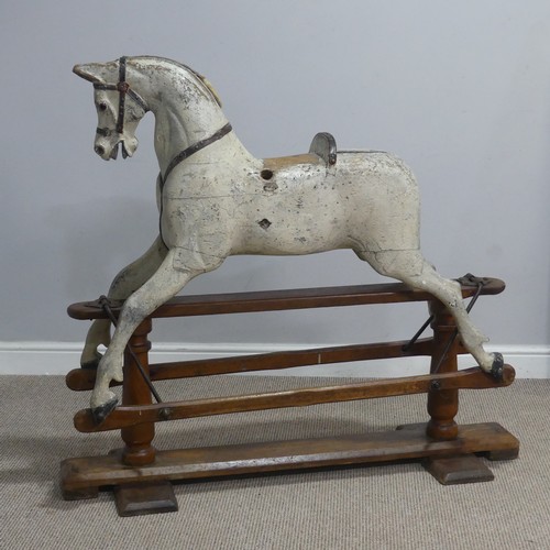 692 - Attributed to G. & J. Lines a Victorian painted wooden Rocking Horse, on pine trestle base stamp... 