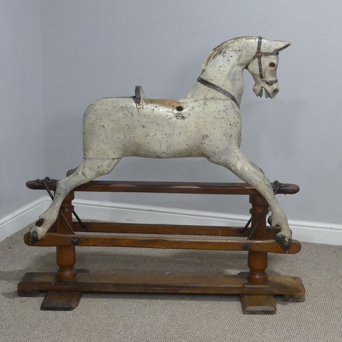 692 - Attributed to G. & J. Lines a Victorian painted wooden Rocking Horse, on pine trestle base stamp... 