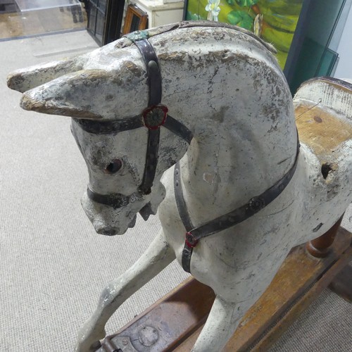 692 - Attributed to G. & J. Lines a Victorian painted wooden Rocking Horse, on pine trestle base stamp... 