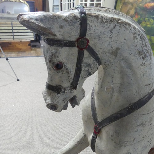 692 - Attributed to G. & J. Lines a Victorian painted wooden Rocking Horse, on pine trestle base stamp... 