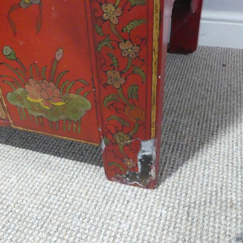 702 - An antique Chinese red-lacquered Cabinet, with two cupboard doors and hinged top compartment, decora... 