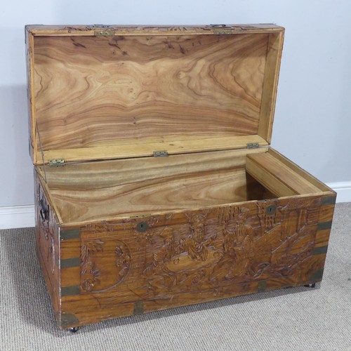 694 - A Chinese carved metal bound camphorwood Chest, with gilt metal inset handles, W 104 cm x H 54.5 cm ... 