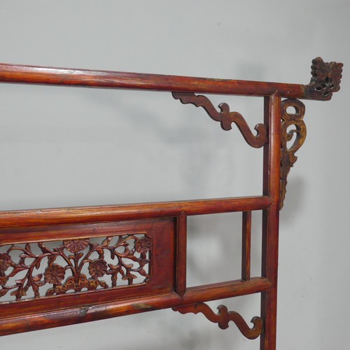 706 - An antique Chinese carved wood clothes/robe Rack, decorated with pierced foliate carvings W 119 cm x... 