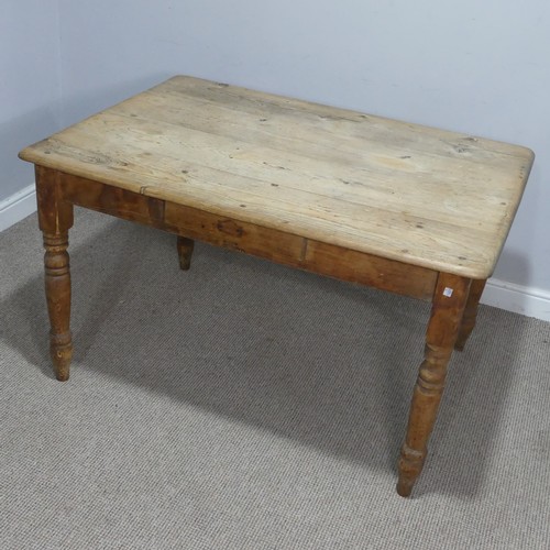 721 - A late 19th century pine kitchen Table, raised on turned supports, W 121 cm x H 72 cm x D 85.5 cm.... 