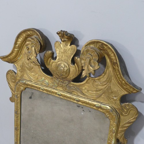 727 - An antique Georgian style gilt painted wall Mirror, of a Chippendale design, W 107 cm x H 57 cm.... 