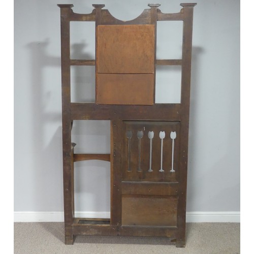 734 - An Arts and Crafts oak hall Stand in the manner of Liberty & co, the central mirror flanked by c... 