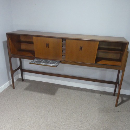 733 - A mid-20th century teak Elliots of Newbury sideboard dining room Set, the sideboard with retracting ... 