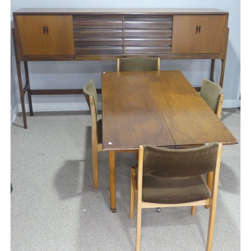 733 - A mid-20th century teak Elliots of Newbury sideboard dining room Set, the sideboard with retracting ... 