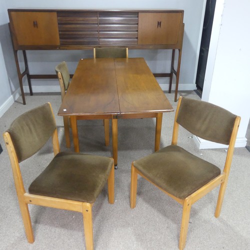 733 - A mid-20th century teak Elliots of Newbury sideboard dining room Set, the sideboard with retracting ... 