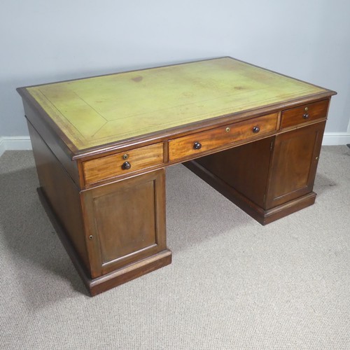 592 - A 19th century mahogany pedestal partners Desk, the large top inset with green gilt-tooled leather w... 