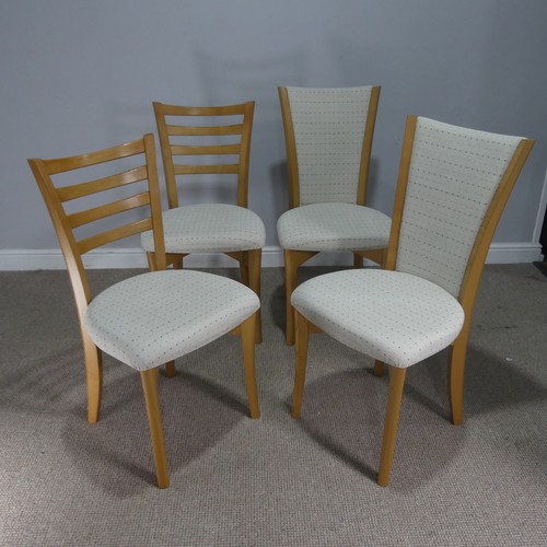 731 - A mid-20th century Ercol blond elm breakfast Suite, the drop-leaf Table with rounded edges complete ... 