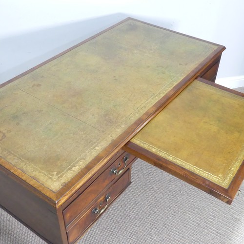 602 - A George III mahogany Desk, the top inset with green gilt-tooled leather writing surface, above brus... 