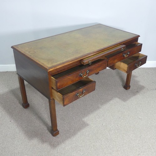 602 - A George III mahogany Desk, the top inset with green gilt-tooled leather writing surface, above brus... 