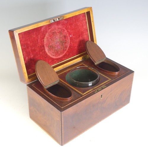 675 - A 19th century mahogany Tea Caddy, with walnut stringing, the interior complete with separate lidded... 