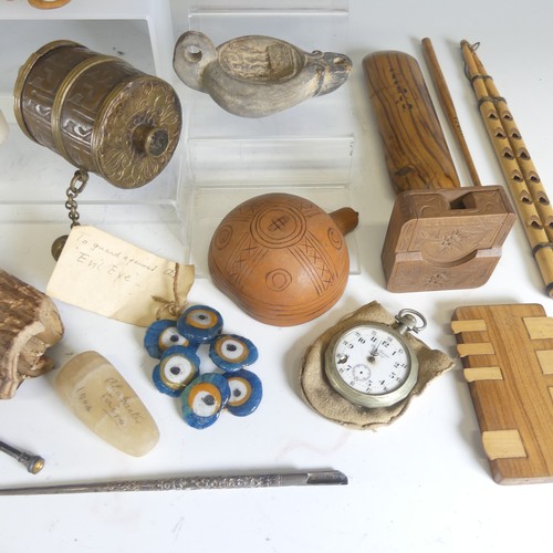 670 - A collection of 'Wonderments', including an early 20th century Tibetan prayer Wheel complete with sc... 