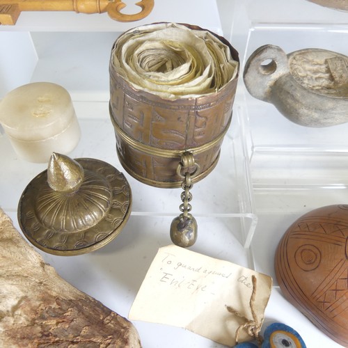 670 - A collection of 'Wonderments', including an early 20th century Tibetan prayer Wheel complete with sc... 