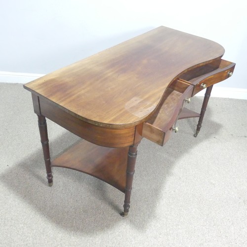 580 - An early 19th century mahogany kidney-shaped dressing/side Table, inlaid with ebony stringing, the k... 