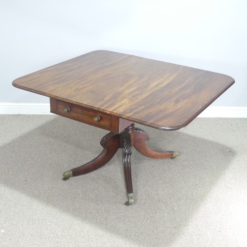 607 - A 19th century mahogany Pembroke Table, raised on turned column and carved splayed quadraform base, ... 