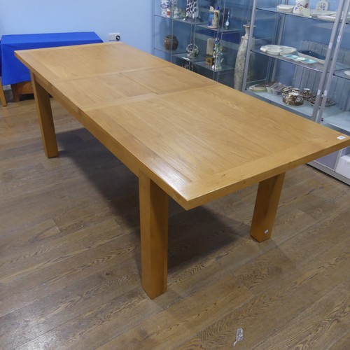 562 - A contemporary light oak dining Table and six Chairs, (Table) W 181 cm x H 78 cm x D 91 cm, (Chairs)... 