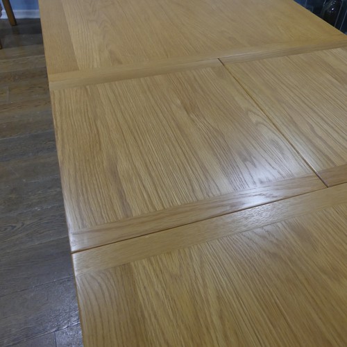 562 - A contemporary light oak dining Table and six Chairs, (Table) W 181 cm x H 78 cm x D 91 cm, (Chairs)... 