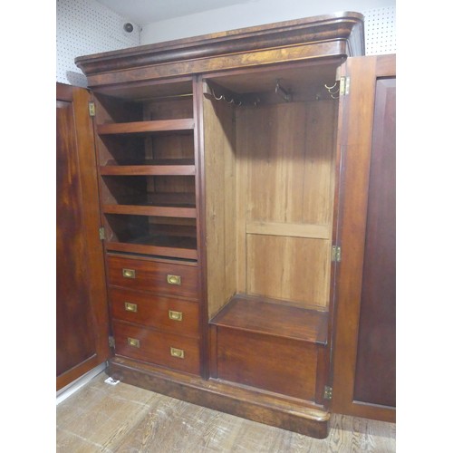 561 - A Victorian burr walnut compactum Wardrobe, the moulded cornice over two doors concealing interior w... 