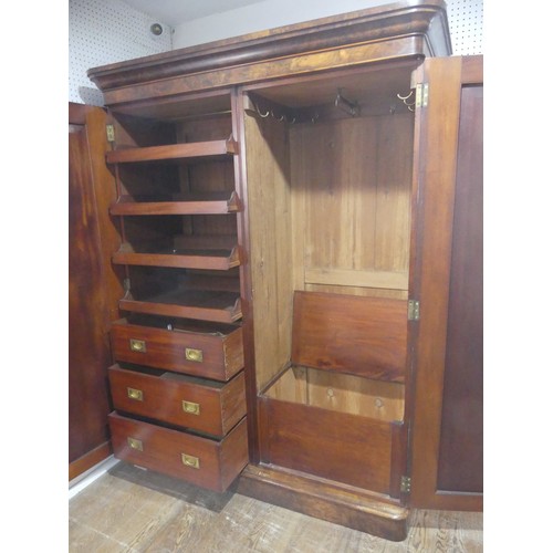 561 - A Victorian burr walnut compactum Wardrobe, the moulded cornice over two doors concealing interior w... 