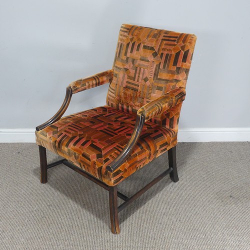 762 - An Edwardian mahogany framed open Armchair, with Art Deco inspired upholstery, raised on squared sup... 